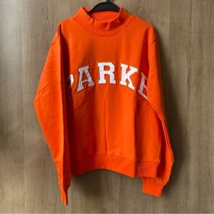 Orange Sweatshirt with White Lettering